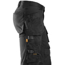 Black 6241 work pants with multiple pockets on a white background