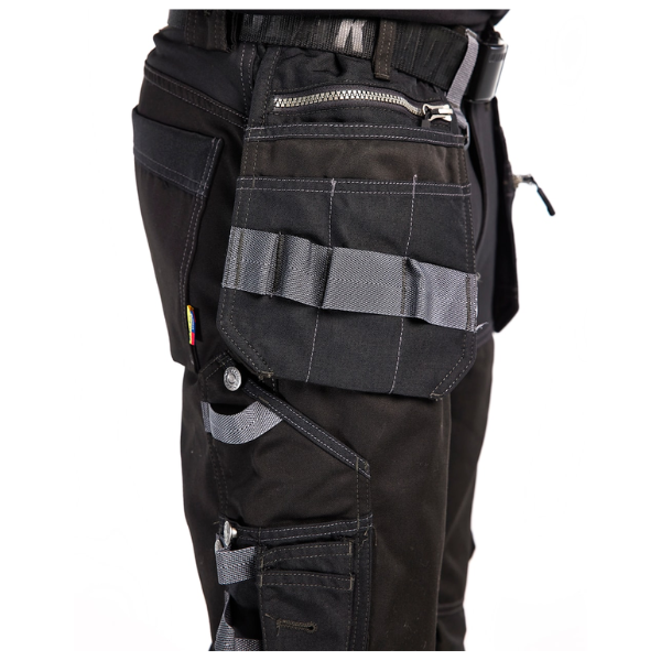 Close-up of the right holster pocket on Blaklader 15991860 Black Craftsman Work Trousers, showing pocket construction and materials.
