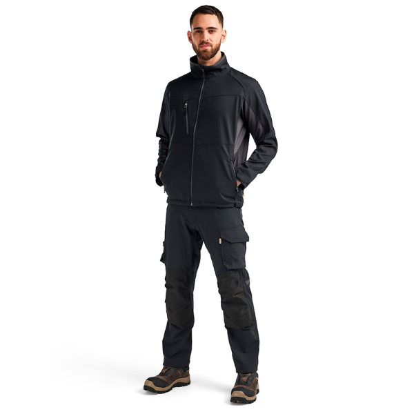 Model wearing the Blaklader 4950 Softshell Jacket.