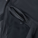 Close-up of a black coat with zipper details on a gray background
