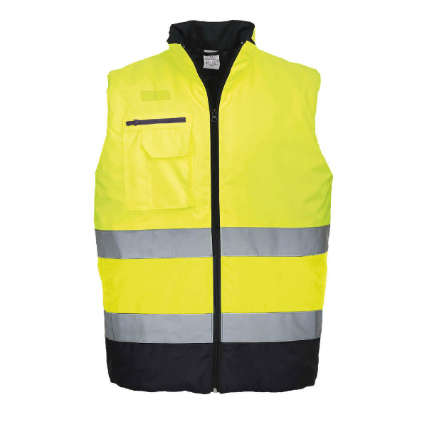 Yellow safety Portwest vest with reflective strip on a white background. High Visibility bodywarmer.