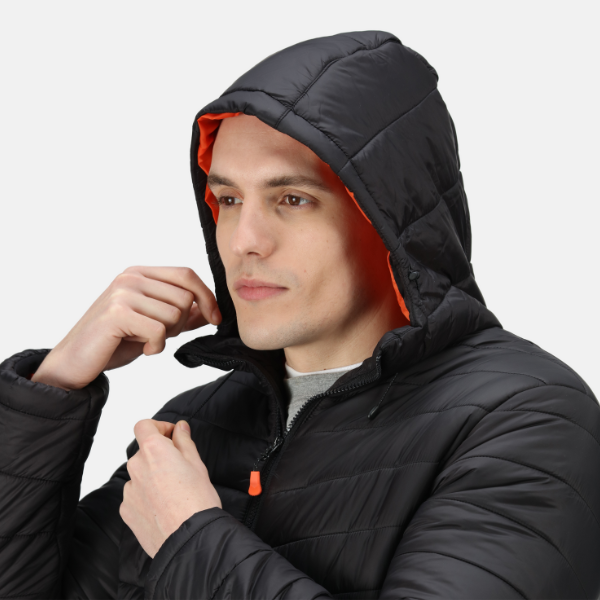 Close-up of the TRA527 Heated Coat with hood up showing red inner lining and zip detail.