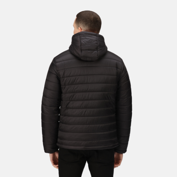 Person wearing a black puffer jacket on a white background. Back view of the Regatta TRA527 Heated Jacket showing quilted panels and hood design – Kustom Workwear studio shot.