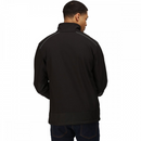 Person wearing a black coat on a white background.