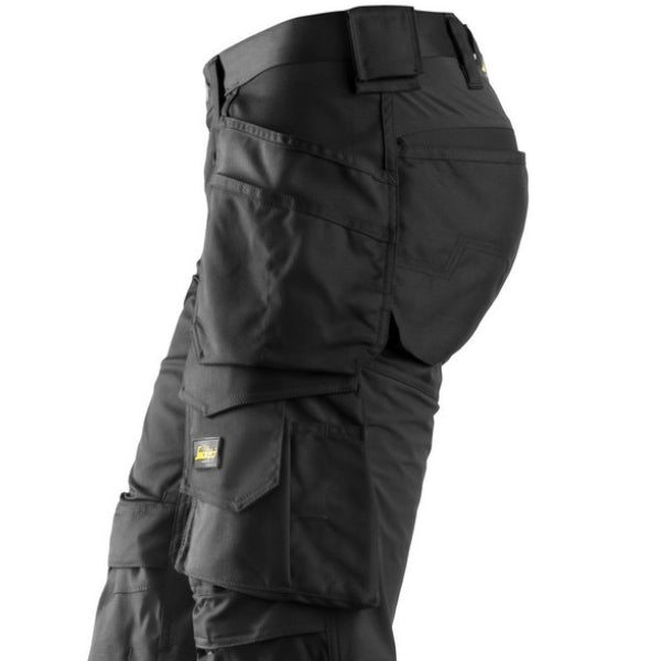 Black trouser, left leg with multiple pockets on a white background