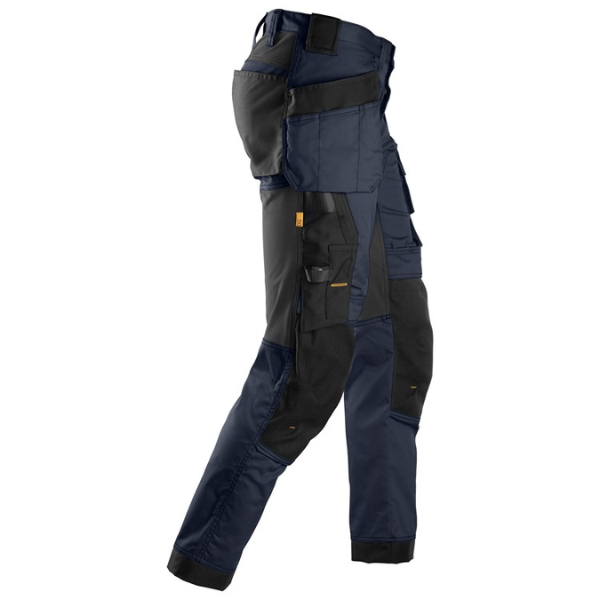 Close up view of the CORDURA® reinforced holster, ruler and cargo pockets on the right leg of Snickers 6241 Trousers.