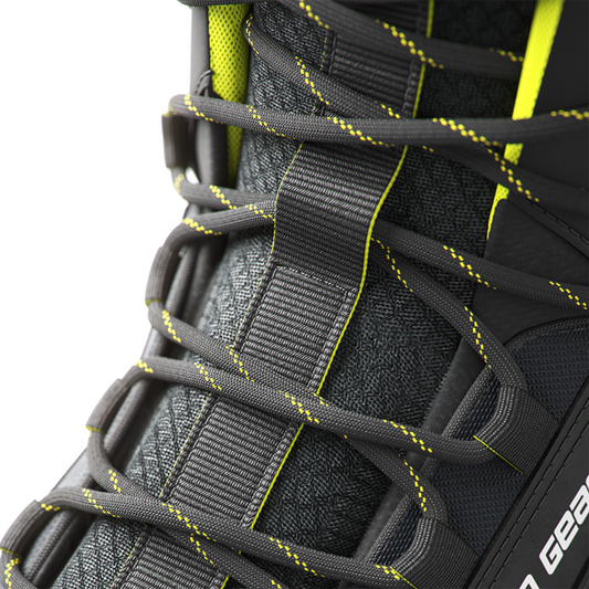 Close up view of laces and tongue on protective work footwear.