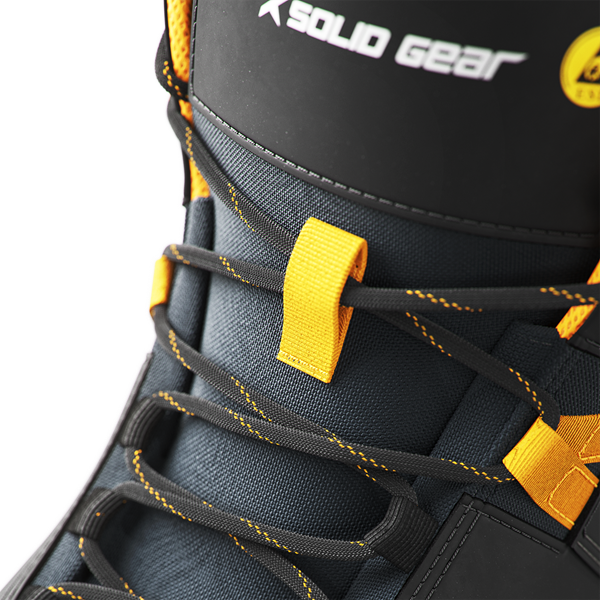 Close up detail of laces on work boots.