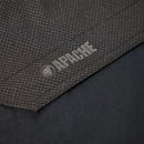 Close-up of a textured fabric surface with 'Apache' branding. Available at Kustom Workwear.