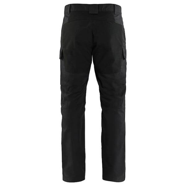 Back view of the Blaklader 1486 stretch FR work trousers in navy showing stretch panel at seat, extended back and leg pocket layout.