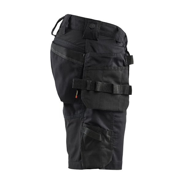 Detail view of the Blaklader 1752 Craftsman shorts in black, showing the ruler pocket and reinforced stitching