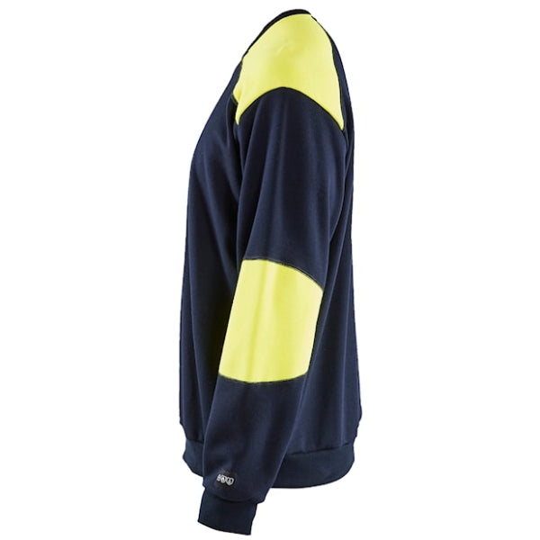 Detail view of the Blaklader Hi-Vis Inherent Flame Resistant Sweatshirt 3458 showing brushed terry fabric texture and rib-knit cuff finish.