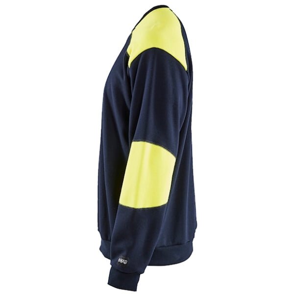 Detail view of the Blaklader Hi-Vis Inherent Flame Resistant Sweatshirt 3458 showing brushed terry fabric texture and rib-knit cuff finish.