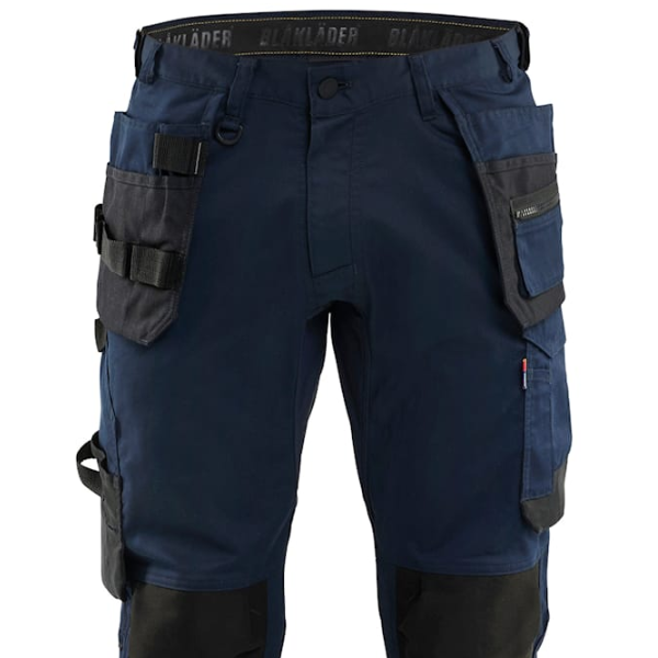 Close-up front view of Blaklader Craftsman Trousers Stretch 1750, highlighting stretch fabric, multi-use pockets, and button fastening.