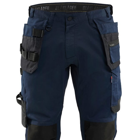 Close-up front view of Blaklader Craftsman Trousers Stretch 1750, highlighting stretch fabric, multi-use pockets, and button fastening.