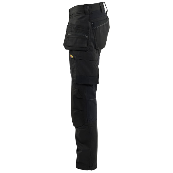 Black craftsman pants with multiple pockets on a white background.