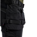 Left side view of black work pants 1750 showing tool holders, utility pockets, and carpenter loops.