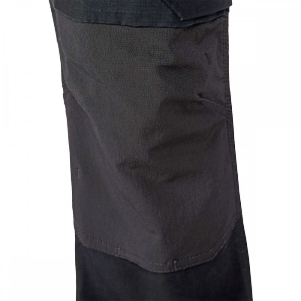 Close-up of black kneed pad pockets on a white background