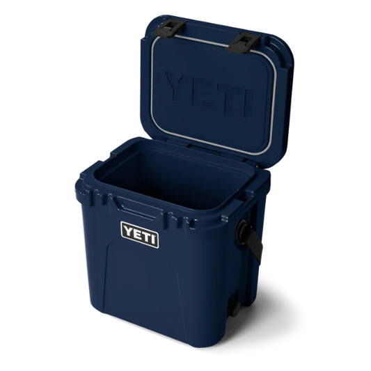 Navy Yeti Roadie cooler box with open lid on a white background. Available at Kustom Workwear.