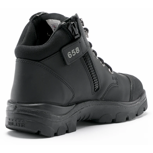 Black Steel Blue boot with a visible brand logo on a white background. Heel view, inner ankle zip.