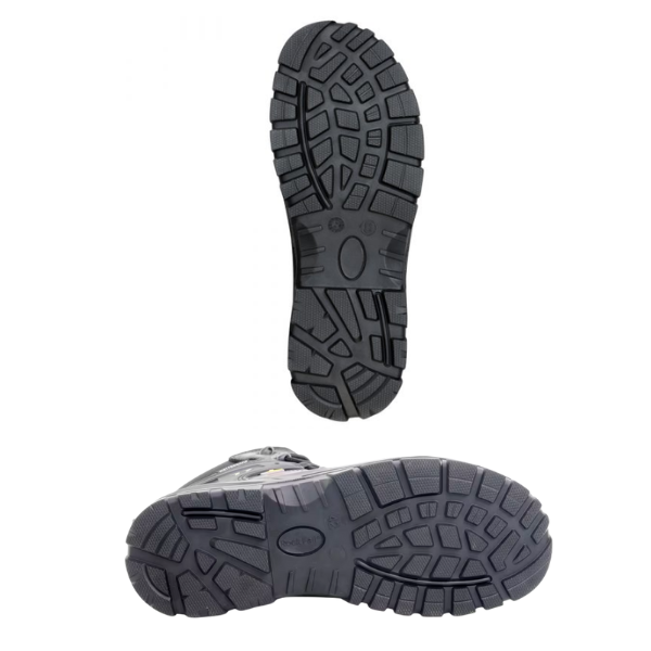 Detailed underside view of Rock Fall safety boot’s heavy-duty nitrile rubber sole with multi-directional grip lugs, offered by Kustom Workwear.