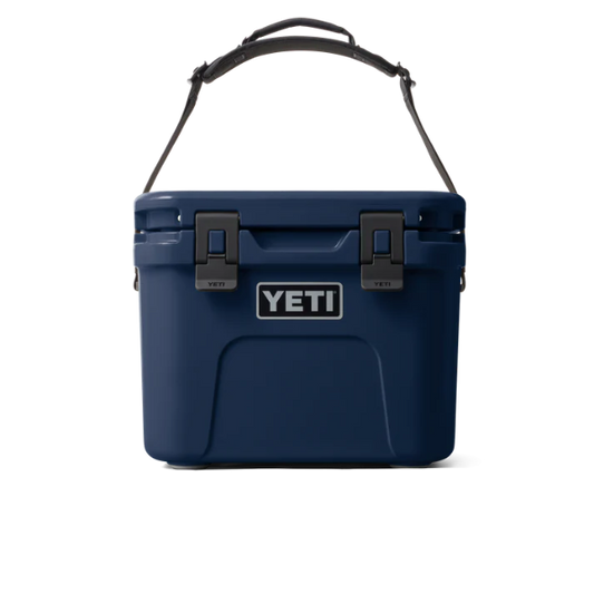 Blue YETI cooler with a black handle on a white background. Available at Kustom Workwear.