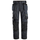 Snickers 6251 AllroundWork stretch loose fit work trousers with holster pockets in steel grey and black, available from Kustom Workwear in Waterford. These Snickers work trousers are built for comfort and utility with reinforced knee zones, 4-way stretch fabric, and a relaxed fit for demanding jobs.