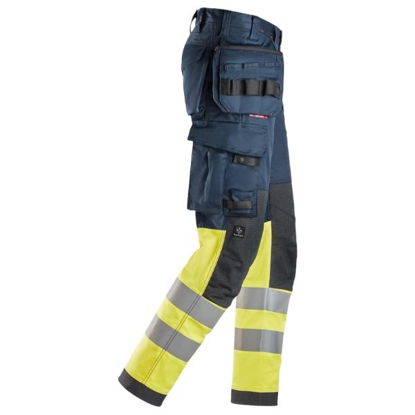 Side view of the Snickers 6274 ProtecWork Arc Stretch Work Trousers in navy and high vis yellow highlighting holster pocket layout and Aramid/Cordura knee reinforcement.