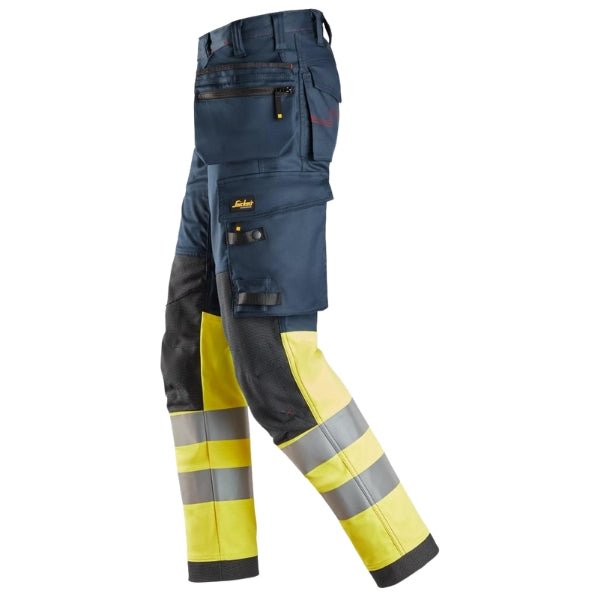 Side view of the Snickers 6274 ProtecWork Arc Stretch Work Trousers in navy and high vis yellow highlighting holster pocket layout and Aramid/Cordura knee reinforcement.
