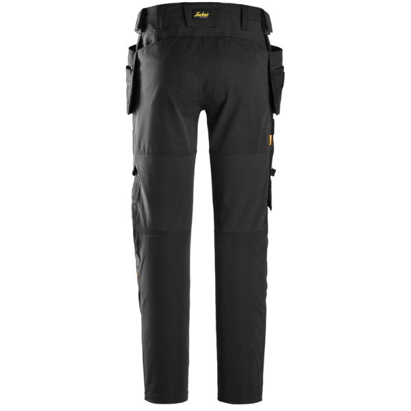 Back view of the Snickers AllroundWork Stretch Work Trousers 6218 in black showing CORDURA holster pockets, tool holders and 4-way stretch fabric.