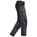 Snickers loose fit 6251 stretch work trousers with holster pockets, distributed by Kustom Workwear in Waterford. Designed with functionality in mind, these Snickers trousers feature flexible 4-way stretch zones and reinforced panels for performance-driven workwear professionals.