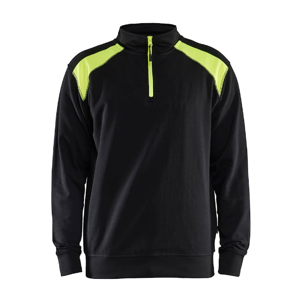 A black and green Blaklader 3353 half-zip 2-tone sweatshirt with a high collar and zipper.