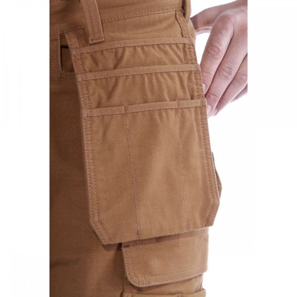 Close-up of brown Carhartt cargo pants with multiple pockets on a white background