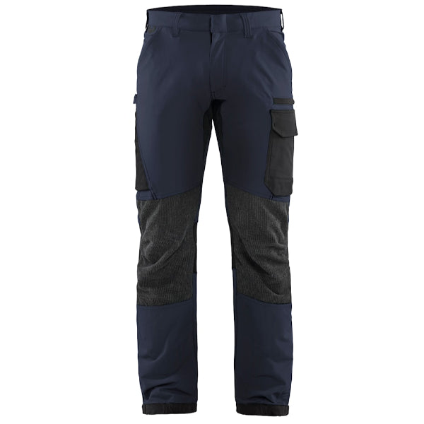 Navy and gray work pants with multiple pockets on a white background